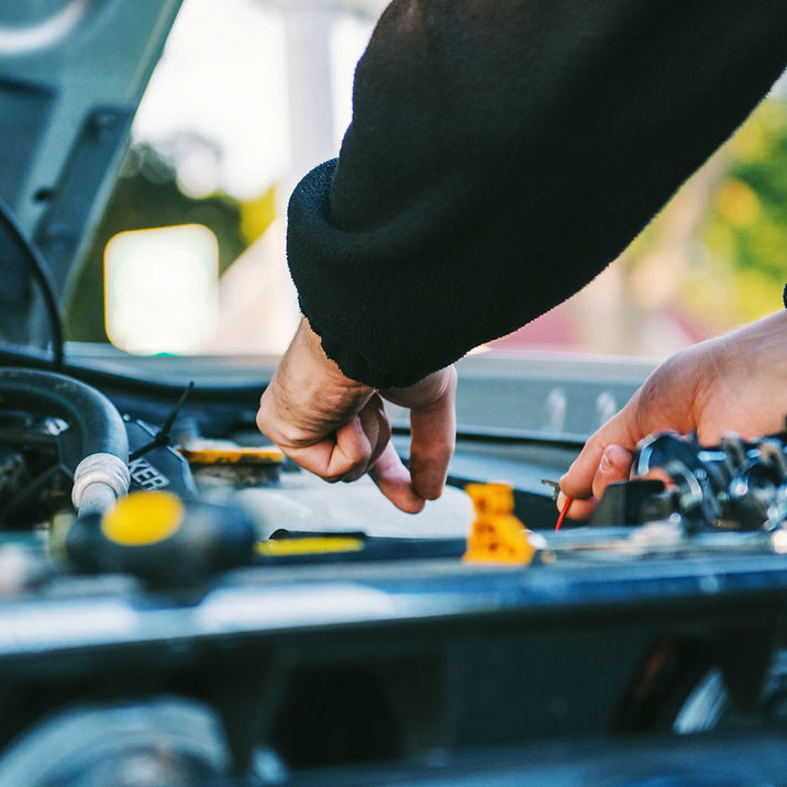 Man fixing car engine