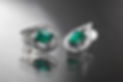 jewellery with gemstone earrings with emeralds and diamonds