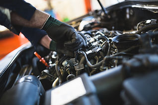 Close-up of hands doing car service and maintenance