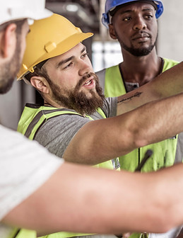 Construction Workers Discussing