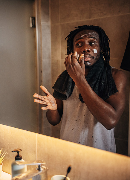 Man Applying Skincare
