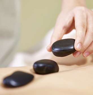 Massage aux pierres chaudes