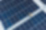 A staff checking solar panels