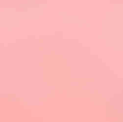 rainbow sprinkles on a pink background.