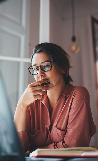 woman looking at computer screen