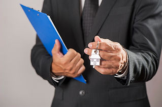 Man holding house key