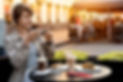 Photographing the table at Cafe