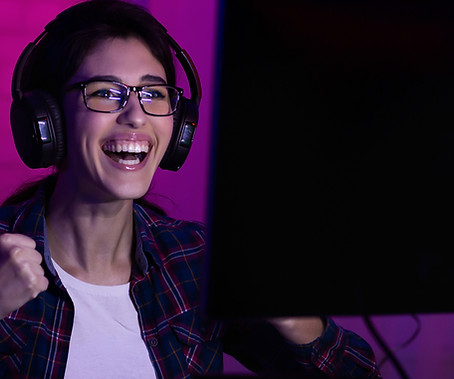 Young woman wins at videogame