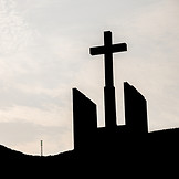 Silhouette of Cross Against Sky