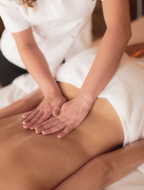 Woman having back massage at a spa