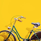 Studio shot of a green bicycle