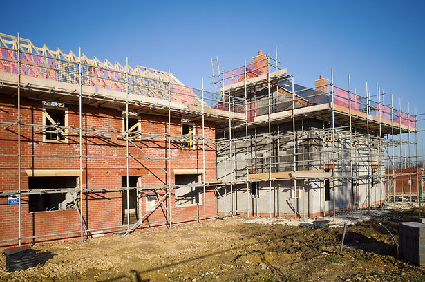 New build housing development with clear blue sky