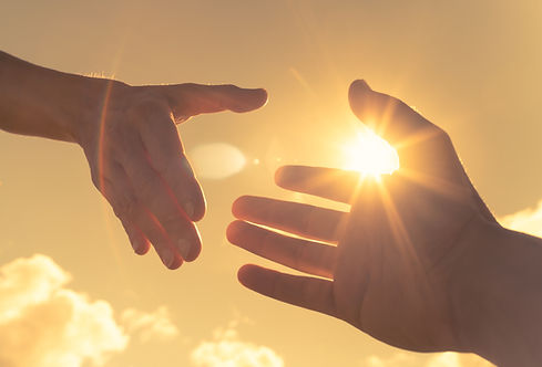 Hands Reaching in Sunlight