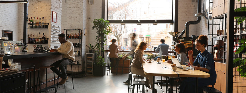 A cafe interior full of customers