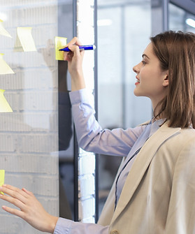 Writing on yellow post-it notes