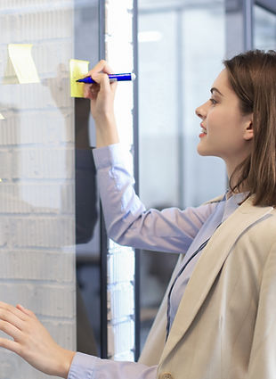 Writing on yellow post-it notes