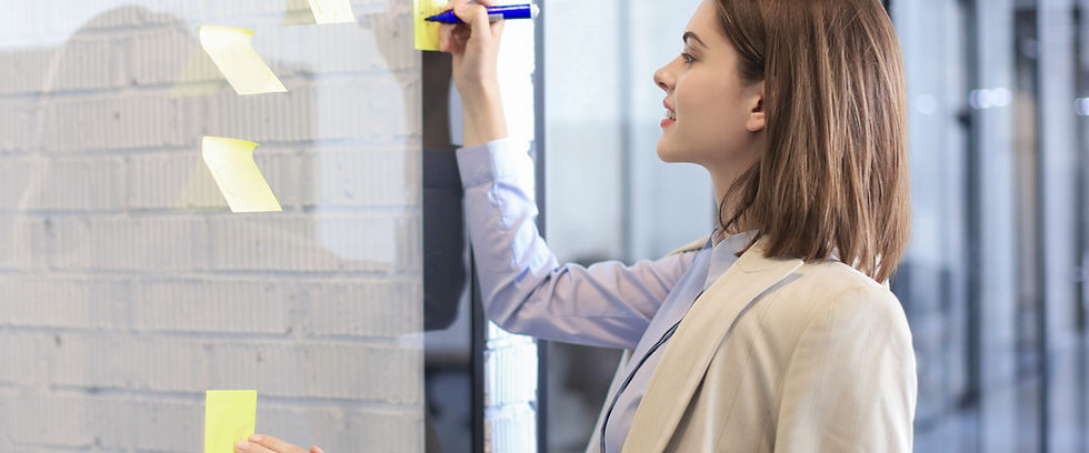 Writing on yellow post-it notes