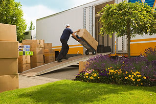 Man loading boxes into truck