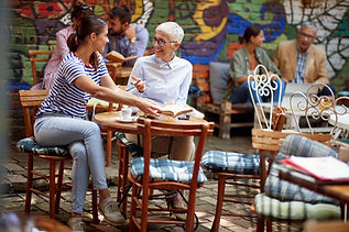 Two people in a cafe