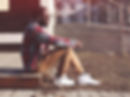 Fashionable man sitting down
