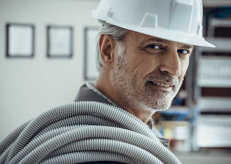 Portrait of electrician at work