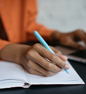 Closeup of pen and notepad