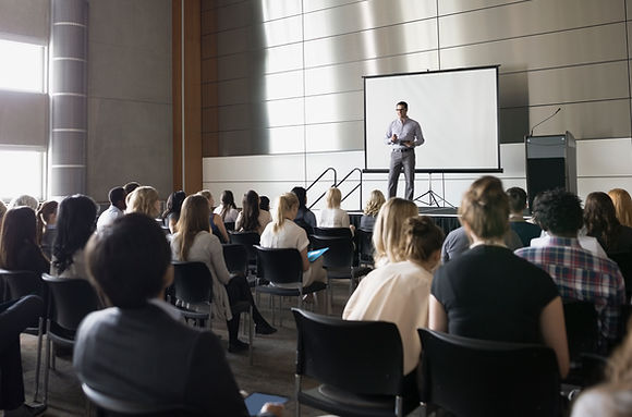 Professor Lecturing on Stage