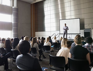 Professor Lecturing on Stage
