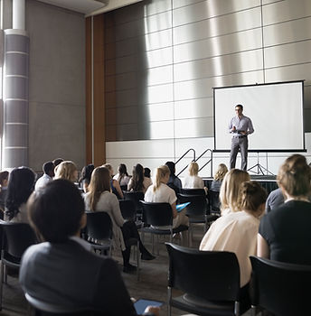 Professor Lecturing on Stage