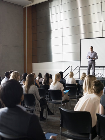 Professor Lecturing on Stage