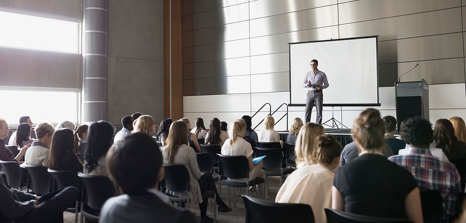 Professor Lecturing on Stage