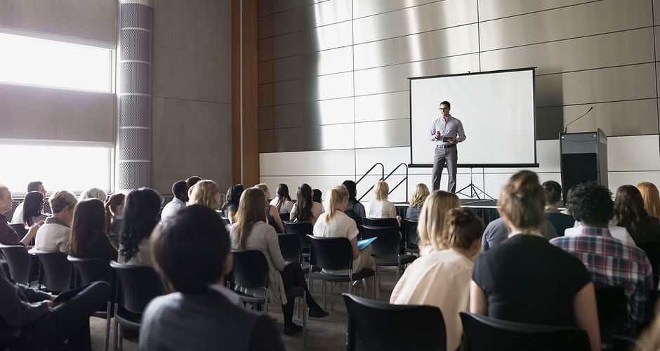 Professor Lecturing on Stage