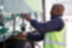 Lorry driver closing up the canopy of an articulated lorry