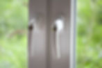 Door handles with key inserted in lock