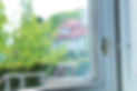 Scenic view from a window showcasing a house