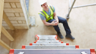 Construction Worker Falling Off Ladder And Injuring Leg