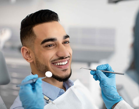 Smiling Man at Dentist