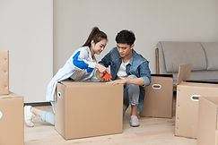 Couple Packing Boxes