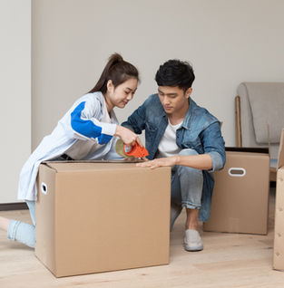 Couple Packing Boxes