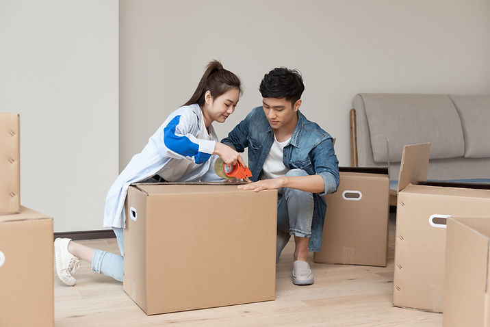 Couple Packing Boxes
