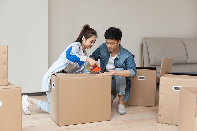 Couple Packing Boxes