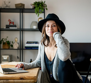 Person with laptop at home