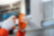 Hands Repairing Air Conditioner