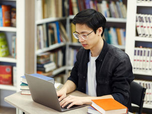 How do scholarships help students access research opportunities amid funding cuts?