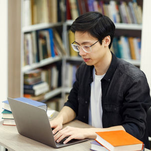 How do scholarships help students access research opportunities amid funding cuts?