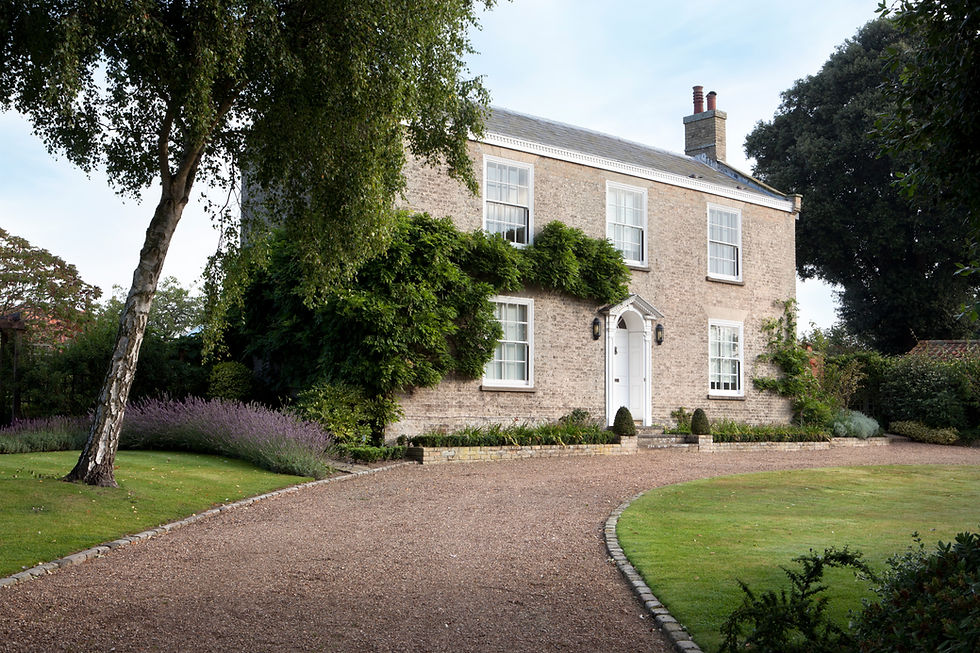 Georgian Manor House, photographed early morning from the entrance of the driveway