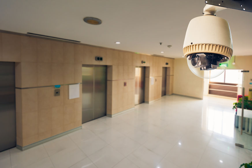 CCTV camera operating in front of elevator