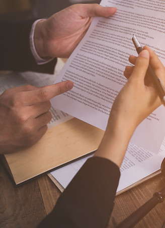 Judges Examining Document