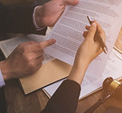 Judges Examining Document