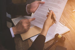 Judges Examining Document